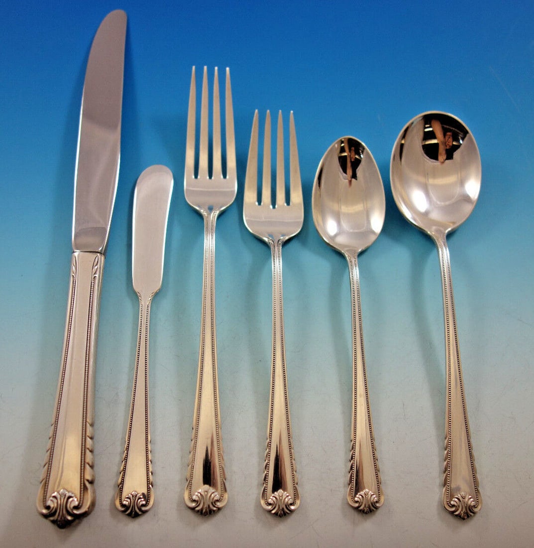 Moonbeam Sterling Silver Flatware Set for 8 with 48 Pieces and Storage Chest: Moonbeam Sterling Silver Flatware Set for 8 with 48 Pieces and Storage Chest Discover the elegance of the Moonbeam pattern with this exquisite International Sterling Silver Flatware Set, designed for 
