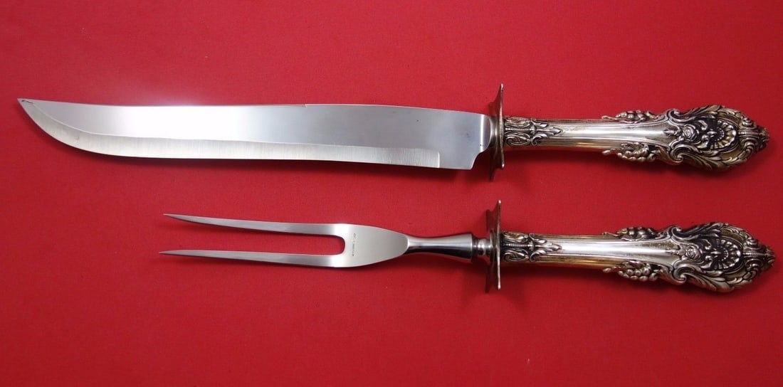 Wallace Sterling Silver Sir Christopher Carving Set 2pc 13.5in: Wallace Sterling Silver Sir Christopher Carving Set 2pc 13.5in Enhance your dining experience with this exquisite Sir Christopher Roast Carving Set by Wallace. This elegant 2-piece set, crafted from s