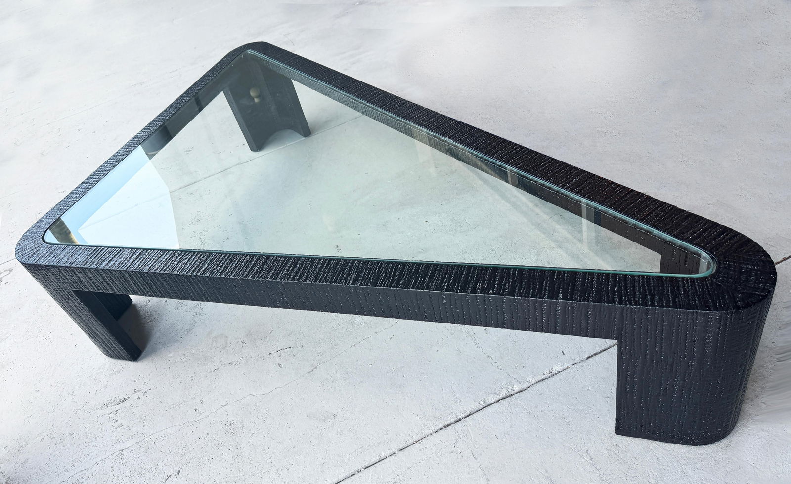 Monumental Vintage Triangular Coffee Table Attributed to Ron Seff: Monumental Vintage Triangular Coffee Table Attributed to Ron Seff This monumental triangular coffee table, attributed to designer Ron Seff, showcases a striking modern aesthetic, making it a captivati