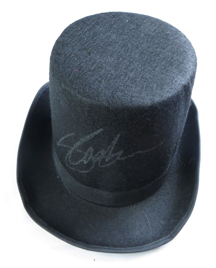 Slash Signed Autographed Hat Guns N' Roses Guitarist: Slash Signed Autographed Hat Guns N' Roses Guitarist This is an original autographed black felt top hat signed by Slash, the legendary guitarist of Guns N' Roses. The hat features an authentic signatu