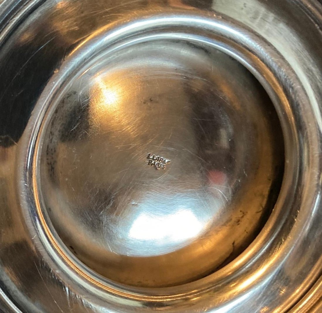 Art Deco Sterling Silver and Wood Bowl by Georges Fouquet-Lapar: Art Deco Sterling Silver and Wood Bowl by Georges Fouquet-Lapar This exquisite tea pot, designed by Georges Fouquet-Lapar, showcases the elegant Art Deco style characteristic of the mid-20th century.