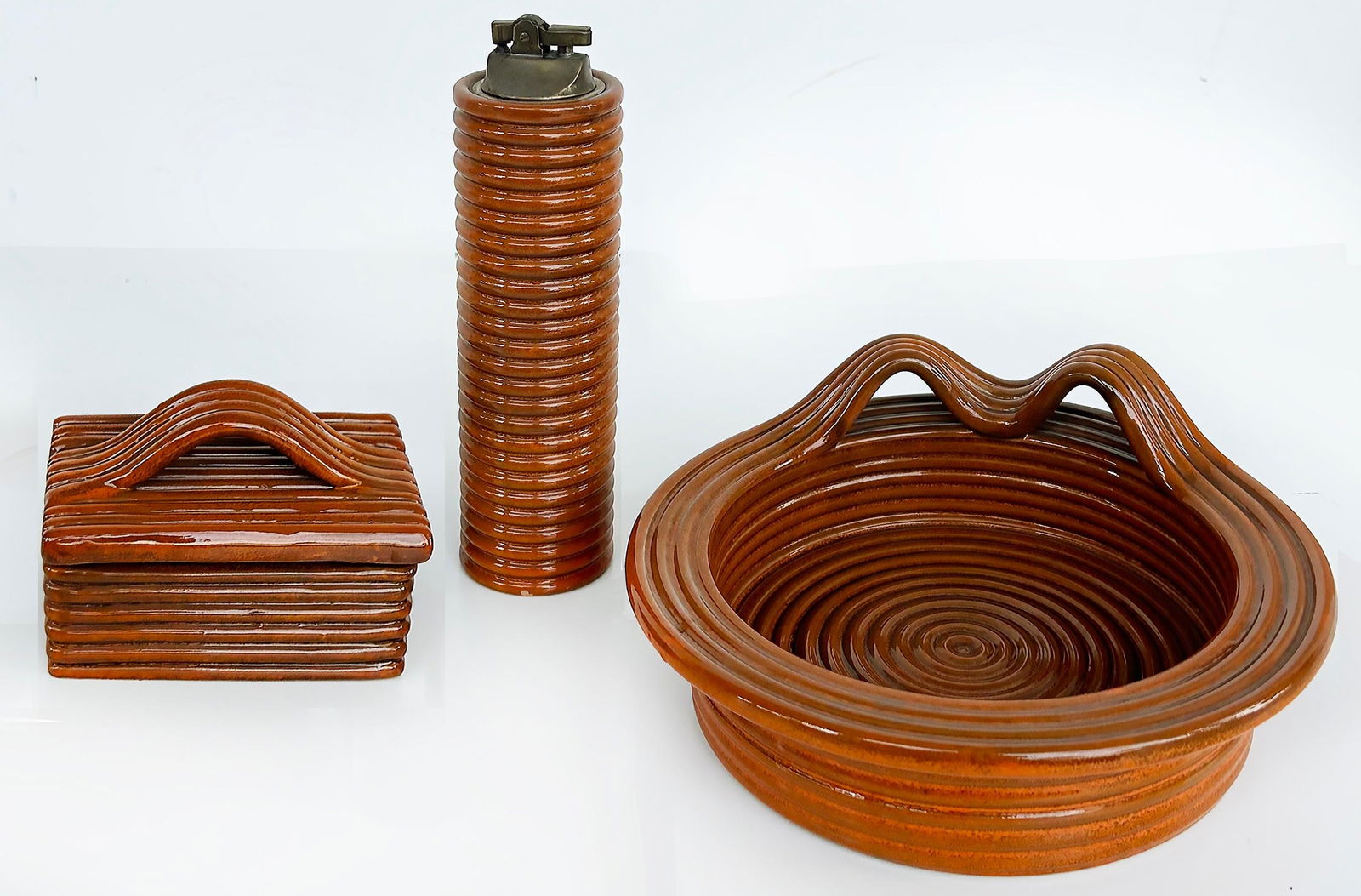 Mid-Century Glazed Ceramic Smoking Set Italy Box Lighter and Ashtray: Mid-Century Glazed Ceramic Smoking Set Italy Box Lighter and Ashtray This exquisite mid-century smoking set by Raymor showcases the elegance of Italian craftsmanship. Comprising a unique round bowl wi