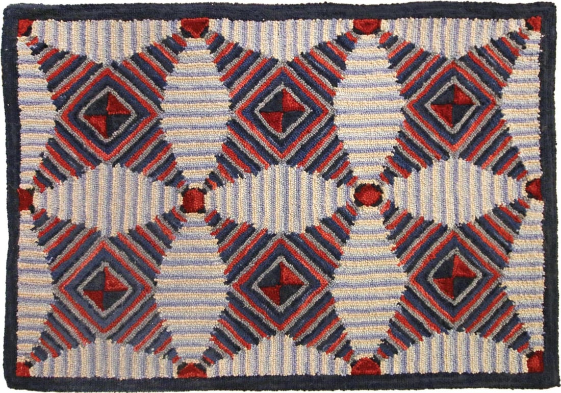 Handmade Vintage Rug in American Quilt Style: Handmade Vintage Rug in American Quilt Style Step back into tradition with the Vintage Celeste Hooked Rug a beautifully revived piece that channels the intricate wonders of Early American quilt patter