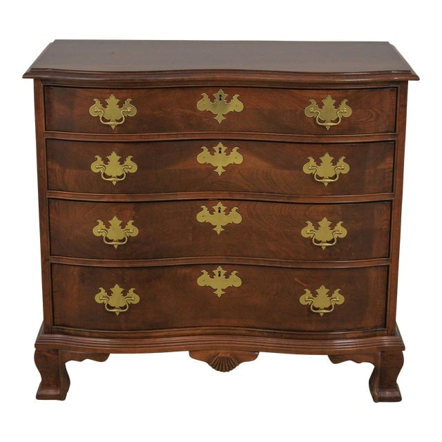 Jasper Chippendale Cherry 4 Drawer Dresser with Brass Hardware: Jasper Chippendale Cherry 4 Drawer Dresser with Brass Hardware This Jasper Chippendale Cherry 4 Drawer Chest Dresser, approximately 20 years old, showcases the timeless beauty of Colonial design. Craf