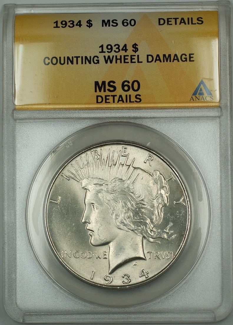 1934 Silver Peace Dollar ANACS MS-60 Uncirculated: 1934 Silver Peace Dollar ANACS MS-60 Uncirculated This 1934 Silver Peace Dollar, graded MS 60 by ANACS, features a unique characteristic of counting wheel damage, enhancing its collectibility. As an u