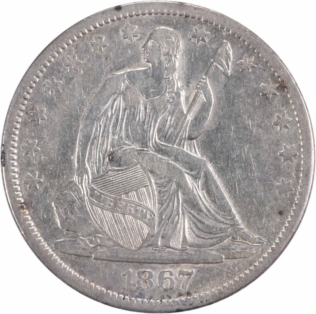 1867-S Seated Liberty Half Dollar AU Circulated: 1867-S Seated Liberty Half Dollar AU Circulated This 1867-S Liberty Seated Half Dollar is a captivating piece of numismatic history, showcasing the seated figure of Liberty, designed by Thomas Sully a