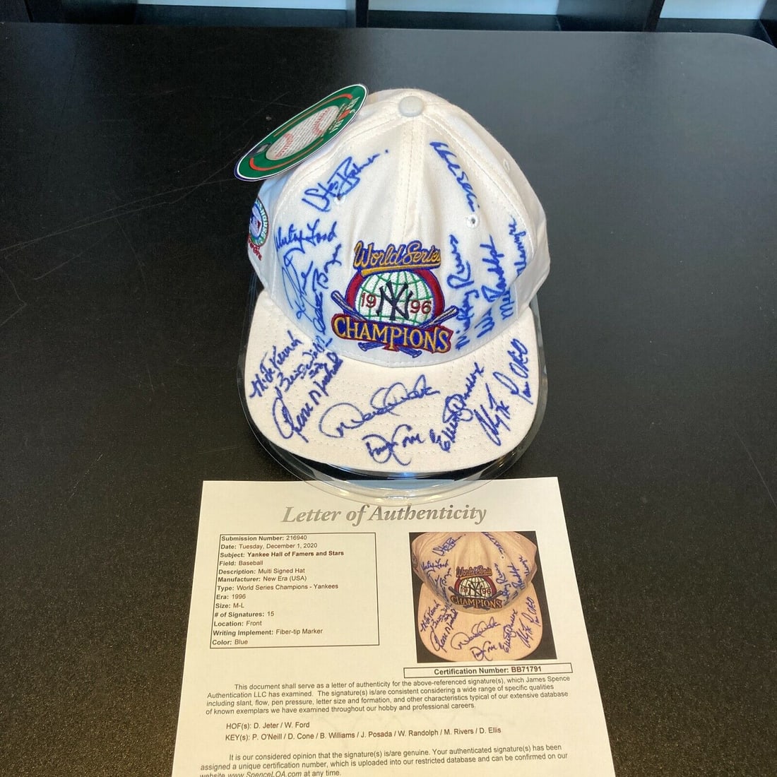1996 New York Yankees Team Signed Baseball With Derek Jeter JSA COA: 1996 New York Yankees Team Signed Baseball With Derek Jeter JSA COA Celebrate the iconic 1996 New York Yankees with this authentic team-signed World Series hat, featuring the text 'World Series Champi