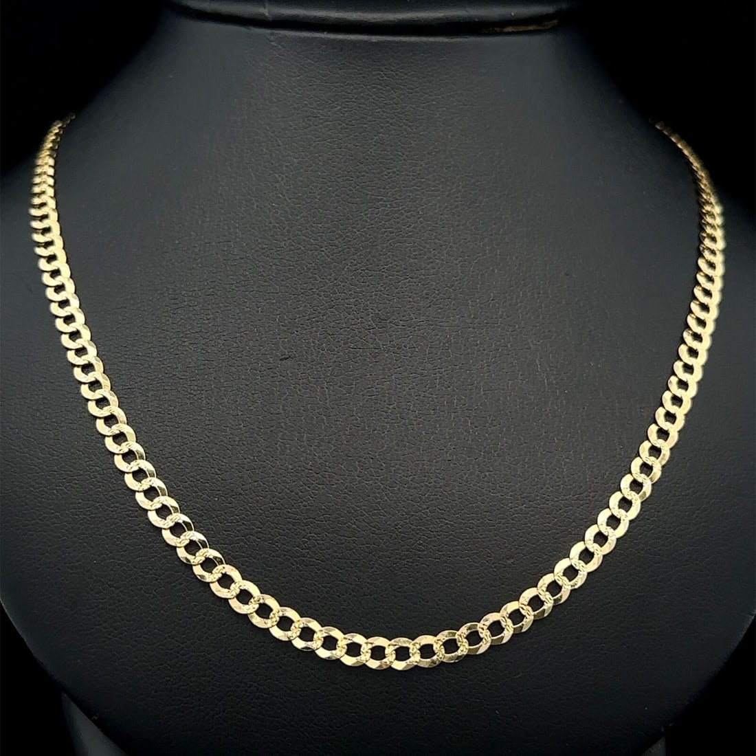14k Yellow Gold 20 Inch Textured Cuban Link Chain Necklace: 14k Yellow Gold 20 Inch Textured Cuban Link Chain Necklace This classic 14k yellow gold chain necklace features a textured curb Cuban link design, perfect for adding a touch of elegance to any outfit.