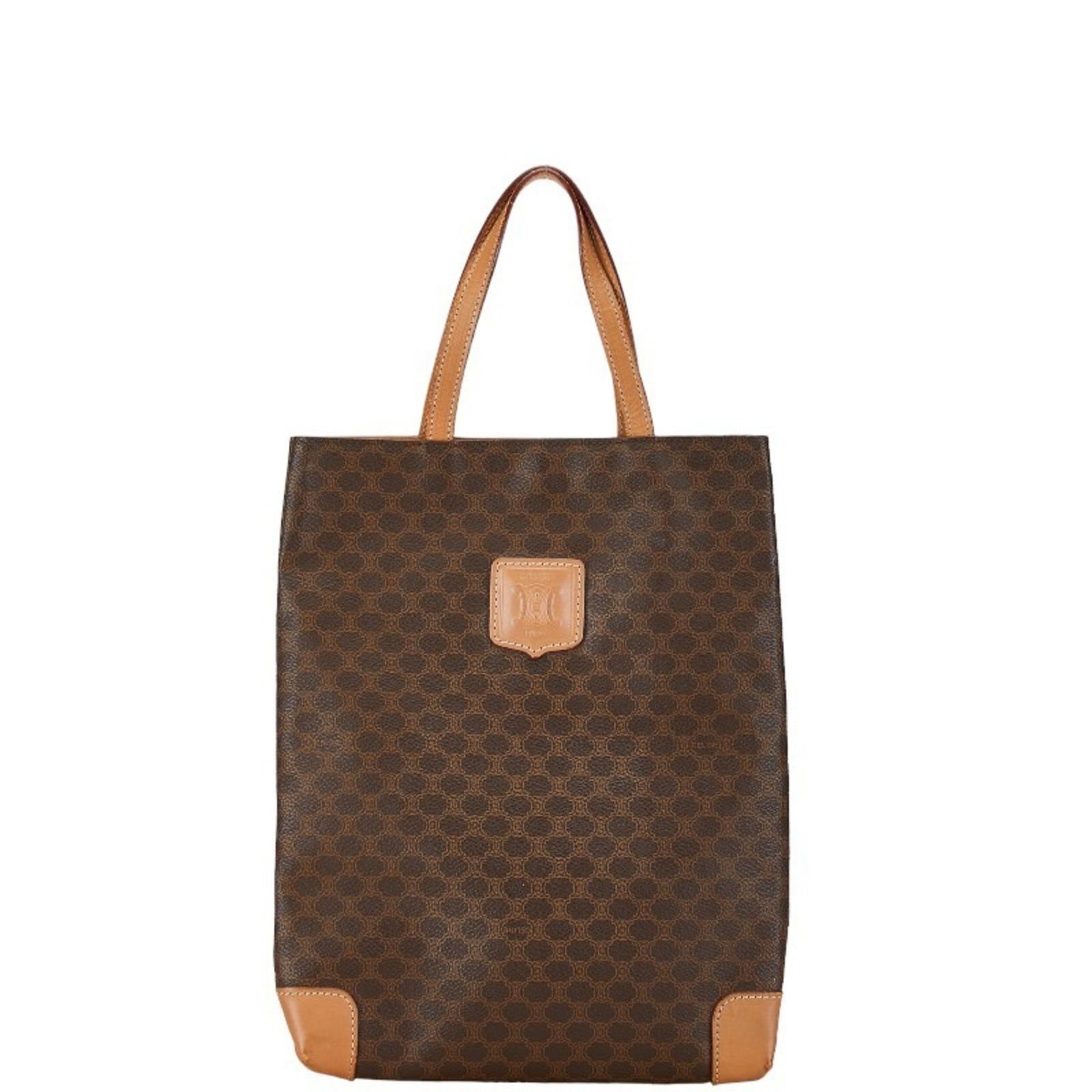 Celine Macadam Brown Canvas Tote Bag 30cm x 24cm Elegant Design: Celine Macadam Brown Canvas Tote Bag 30cm x 24cm Elegant Design The Celine Macadam is a chic tote bag designed for women, crafted from durable canvas in a rich brown color. It measures 30cm in width,