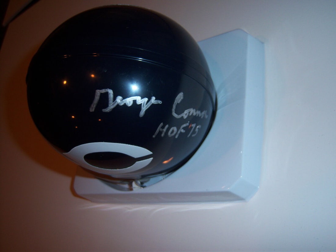 George Connor Signed Mini Helmet - NFL Bears HOF: George Connor Signed Mini Helmet - NFL Bears HOF This is an original mini helmet signed by George Connor, a Hall of Fame linebacker. The helmet is suitable for collectors and fans of NFL memorabilia.