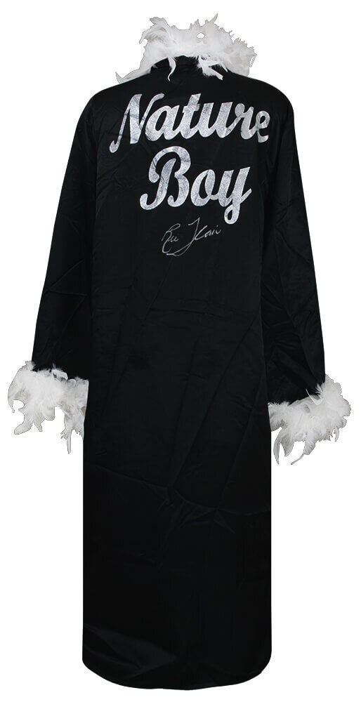 Ric Flair Signed Nature Boy Black Wrestling Full Length Robe: Ric Flair Signed Nature Boy Black Wrestling Full Length Robe This authentic Ric Flair signed black wrestling robe is a must-have for any wrestling fan or collector. The robe features luxurious white f