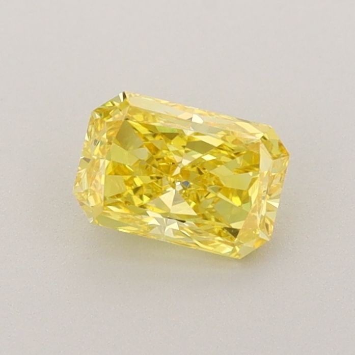 Loose Diamond - RADIANT 0.5ct Fancy Vivid Yellow VS1: Loose Diamond - RADIANT 0.5ct Fancy Vivid Yellow VS1 Source: This is a real non-mined Diamond that has been grown in a lab Shape: RADIANT Carats: 0.5 Color: Fancy Vivid Yellow Certification: IGI Video