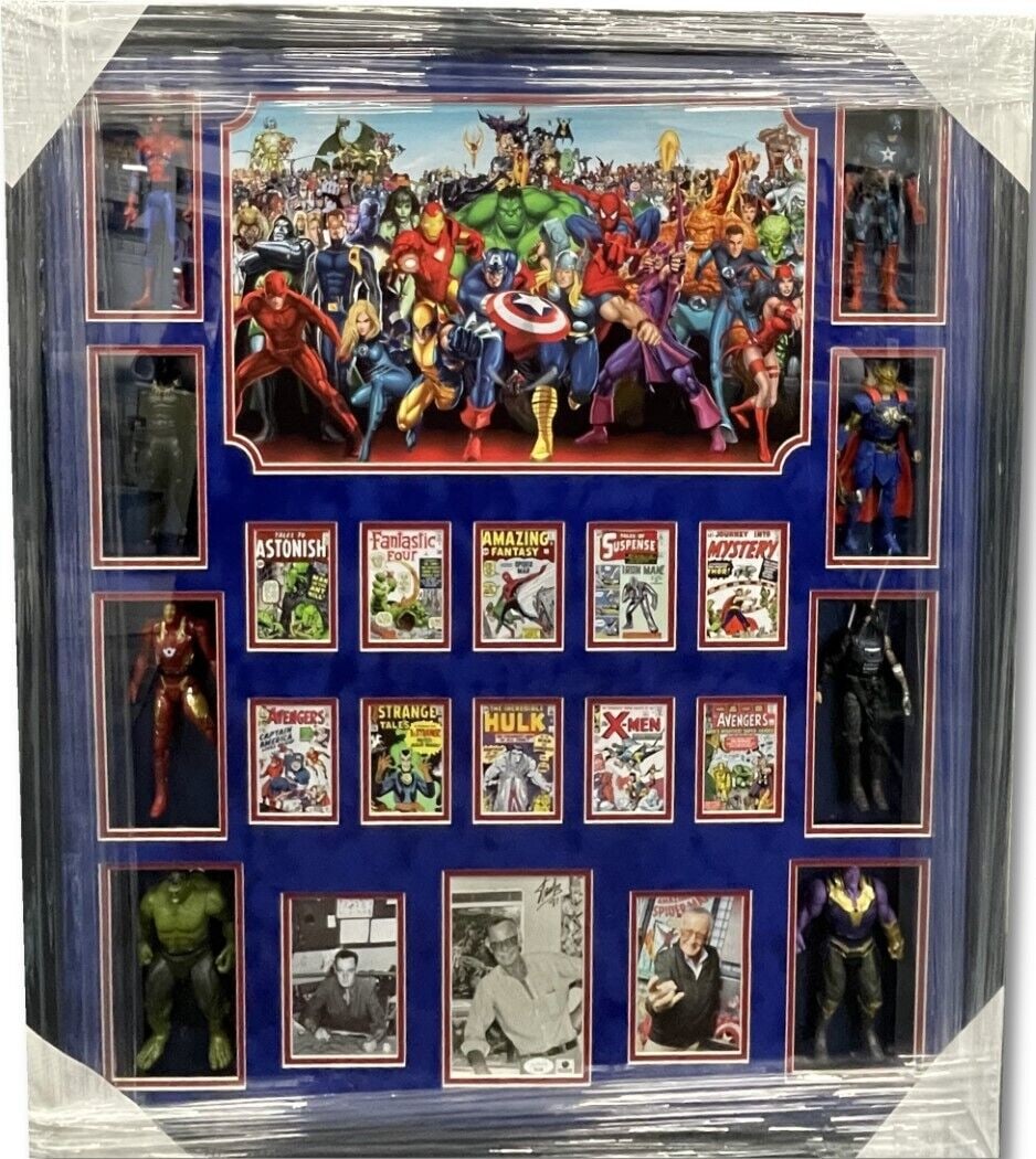 Stan Lee Signed 5x7 Photo Custom Framed with Marvel Figurines JSA: Stan Lee Signed 5x7 Photo Custom Framed with Marvel Figurines JSA This stunning display features a custom-framed 5x7 photo autographed by the legendary Stan Lee, the iconic co-creator of Marvel superh
