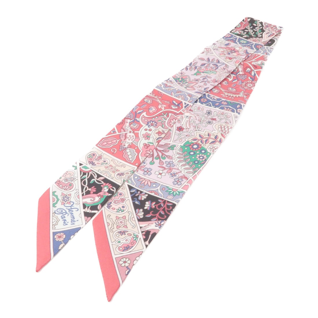 HERMES Twilly Scarf Silk Pink: HERMES Twilly Scarf Silk Pink Elevate your accessory collection with this beautiful HERMES Twilly scarf, crafted from luxurious silk. This long scarf features a stunning design adorned with vibrant fl