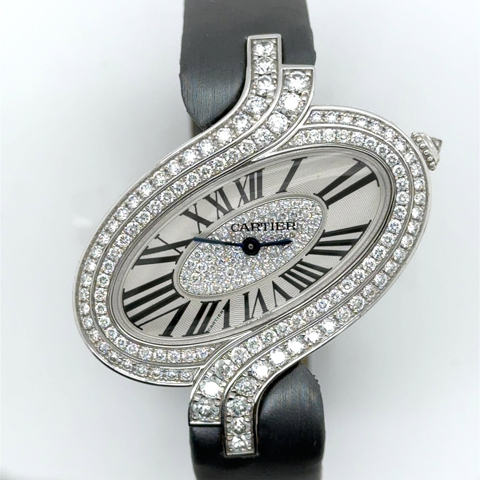 Cartier Delices de Cartier Diamond White Gold Satin Band 3380: Cartier Delices de Cartier Diamond White Gold Satin Band 3380 Creator: Cartier Case Material: 18k Gold Gold White Gold Stone: Diamond White Diamond Stone Cut: Round Cut Weight: 72.2 g Movement: Quartz