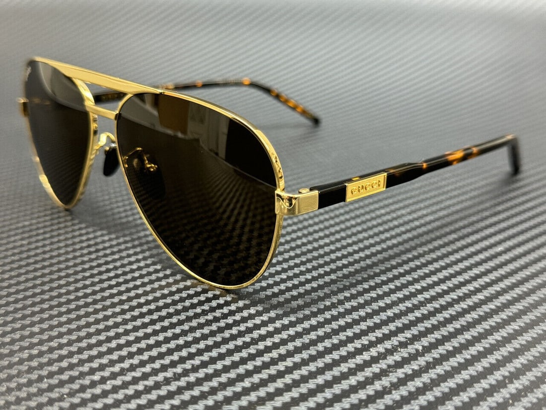 GUCCI GG1163S 004 Gold Frame Sunglasses: GUCCI GG1163S 004 Gold Frame Sunglasses Brand: Gucci. Frame Color: Gold. Type: Sunglasses. Condition: New. Specifications Brand: Gucci Frame Color: Gold Type: Sunglasses Condition: New Size: 60 mm The