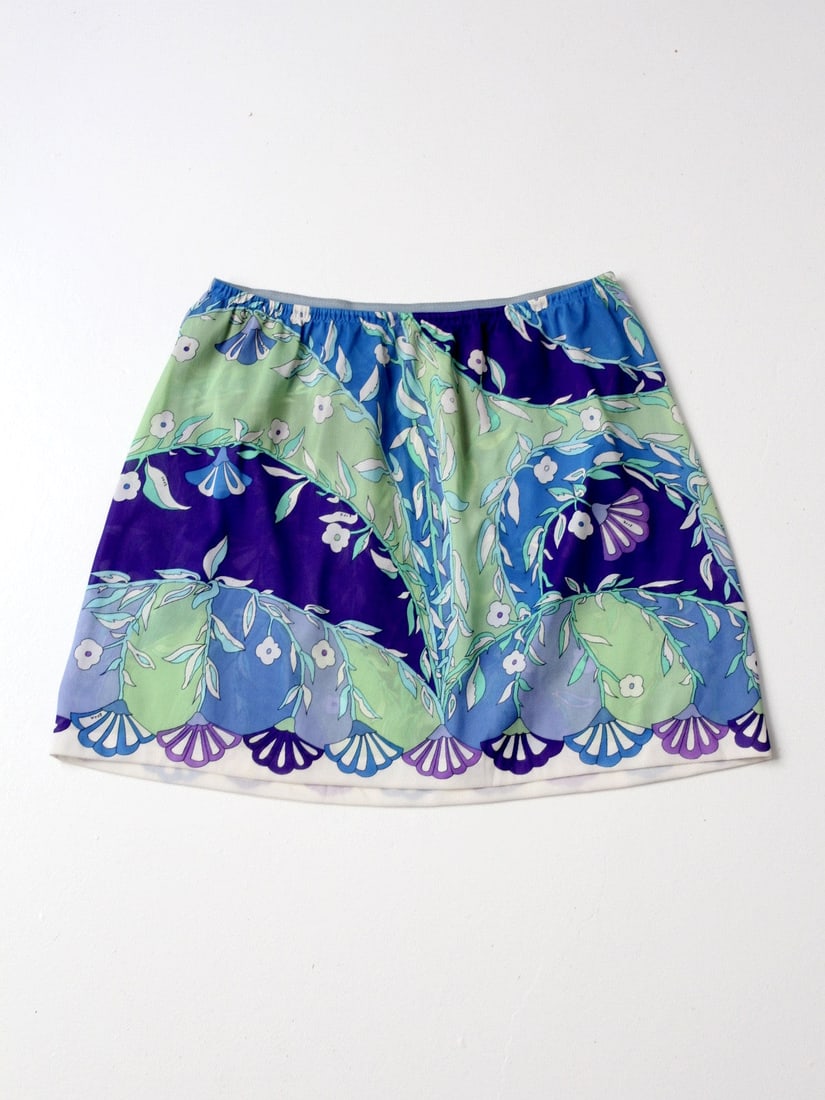 Vintage 60s Emilio Pucci Half Slip: Vintage 60s Emilio Pucci Half Slip Explore this vintage Emilio Pucci half slip from the 60s, featuring a vibrant floral print that adds a touch of classic elegance to your wardrobe. Designed with an e