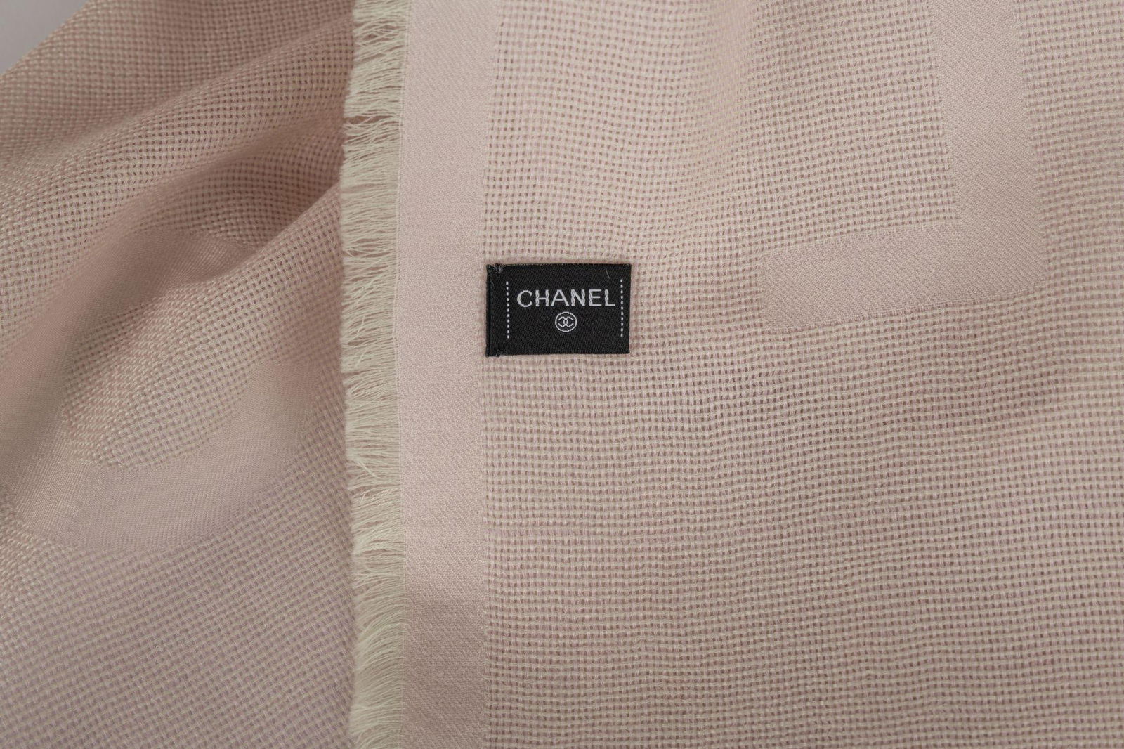 Chanel Powder Pink Cashmere Shawl 30 x 82 Fringed Italy: Chanel Powder Pink Cashmere Shawl 30 x 82 Fringed Italy Elevate your style with this exquisite cashmere shawl from Chanel. Crafted in a beautiful powder pink hue, this luxurious accessory features a f