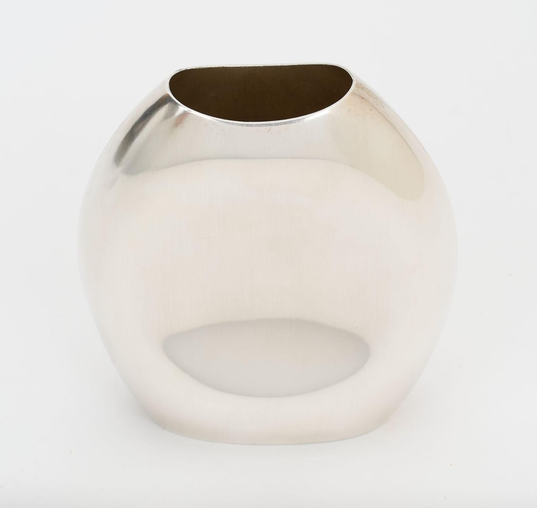 Hermes 21st Century Small Silver Plate Metal Vase 4.5 Inches: Hermes 21st Century Small Silver Plate Metal Vase 4.5 Inches This Hermes Small Silver Plate Metal Vase is a striking piece from the 21st Century. The vase features a sleek design with dimensions of 4.