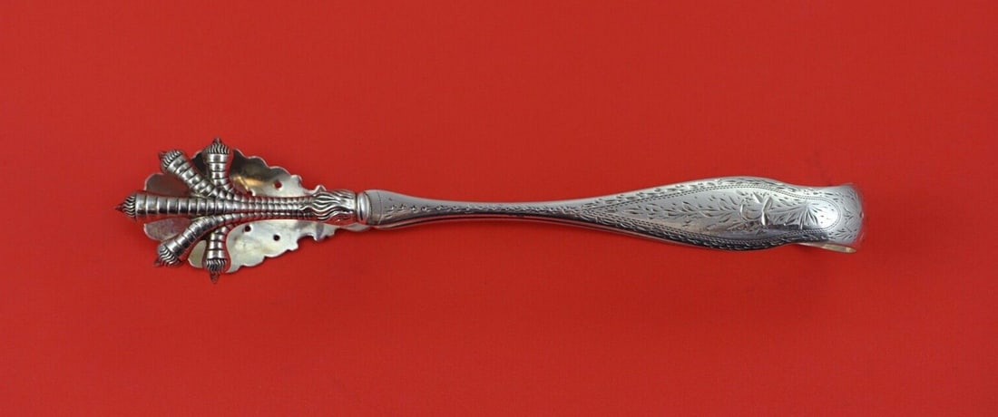 George Sharp Sterling Silver Ice Tong Eagle Claw and Cast Shell: George Sharp Sterling Silver Ice Tong Eagle Claw and Cast Shell This exquisite sterling silver ice tong features an elegant eagle claw design and a cast shell motif, showcasing intricate brite-cut det