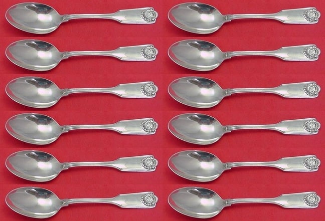 Fiddle Shell Sterling Silver Teaspoon Set 12 Pieces 5 3/4": Fiddle Shell Sterling Silver Teaspoon Set 12 Pieces 5 3/4" This exquisite 12-piece set of teaspoons showcases the Fiddle Shell pattern by Frank Smith, crafted from high-quality sterling silver. Each s