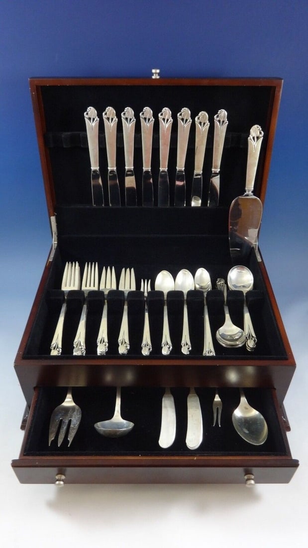 Woodlily Sterling Silver Flatware Set for 8 Service 69 Pieces: Woodlily Sterling Silver Flatware Set for 8 Service 69 Pieces Enhance your dining experience with the Woodlily flatware set by Frank Smith, crafted from sterling silver and showcasing a stunning mid-c