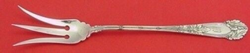 Oak Sterling Silver Lettuce Fork 8 3/4": Oak Sterling Silver Lettuce Fork 8 3/4" This exquisite serving fork is part of the Oak pattern by Frank Smith, crafted from sterling silver. Measuring 8 3/4" in length, it features a beautifully decor