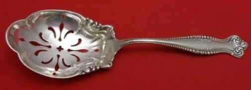 Canterbury Sterling Silver Ice Spoon Pierced 8" Serving Silverware: Canterbury Sterling Silver Ice Spoon Pierced 8" Serving Silverware This exquisite Canterbury by Towle Sterling Silver Ice Spoon features a beautifully pierced bowl and an ornate handle, making it a st