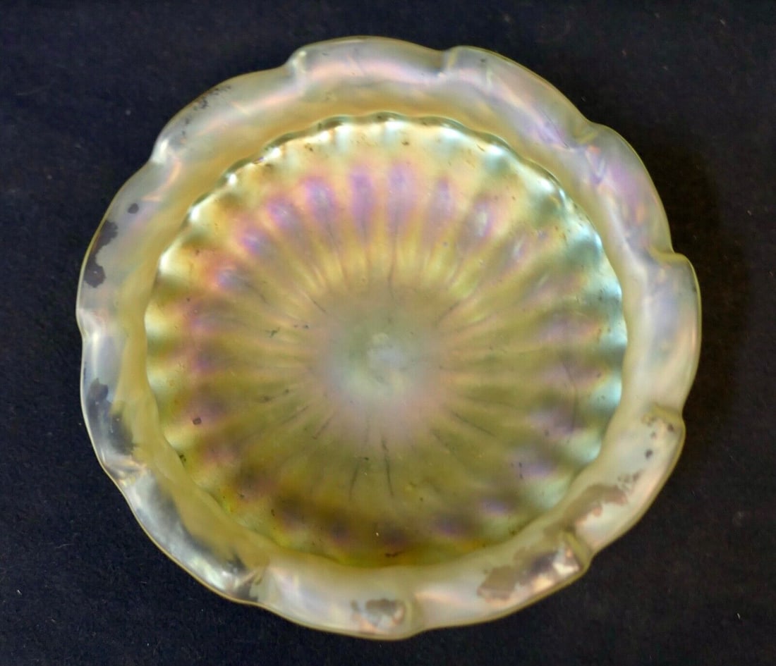 Art Nouveau Hand Blown Iridescent Gold Bowl: Art Nouveau Hand Blown Iridescent Gold Bowl This exquisite Loetz Art Glass Bowl embodies the elegance of Art Nouveau style, featuring a stunning iridescent gold finish. Crafted in the early 20th centu
