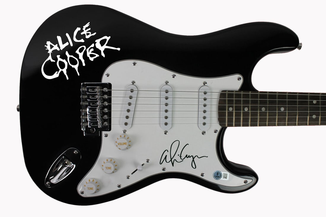 Alice Cooper Signed Black Electric Guitar with Decal: Alice Cooper Signed Black Electric Guitar with Decal This authentic black electric guitar, signed by music legend Alice Cooper, is a must-have for any collector. The guitar features a striking black b