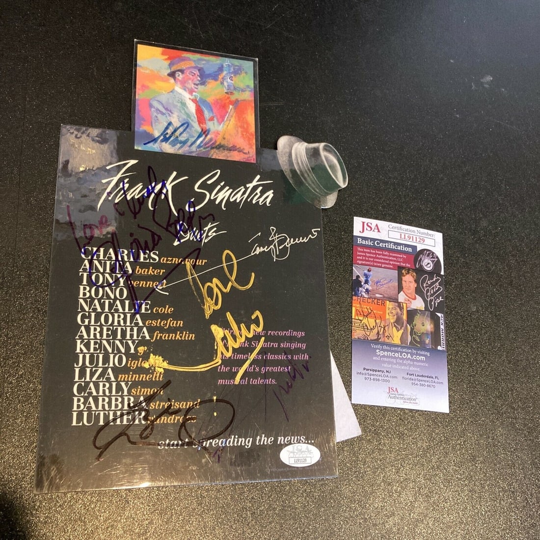 Frank Sinatra Signed Display with Liza Minnelli Tony Bennett Estefan Neiman JSA: Frank Sinatra Signed Display with Liza Minnelli Tony Bennett Estefan Neiman JSA This unique signed display features a Frank Sinatra album cover adorned with the autographs of renowned artists includin