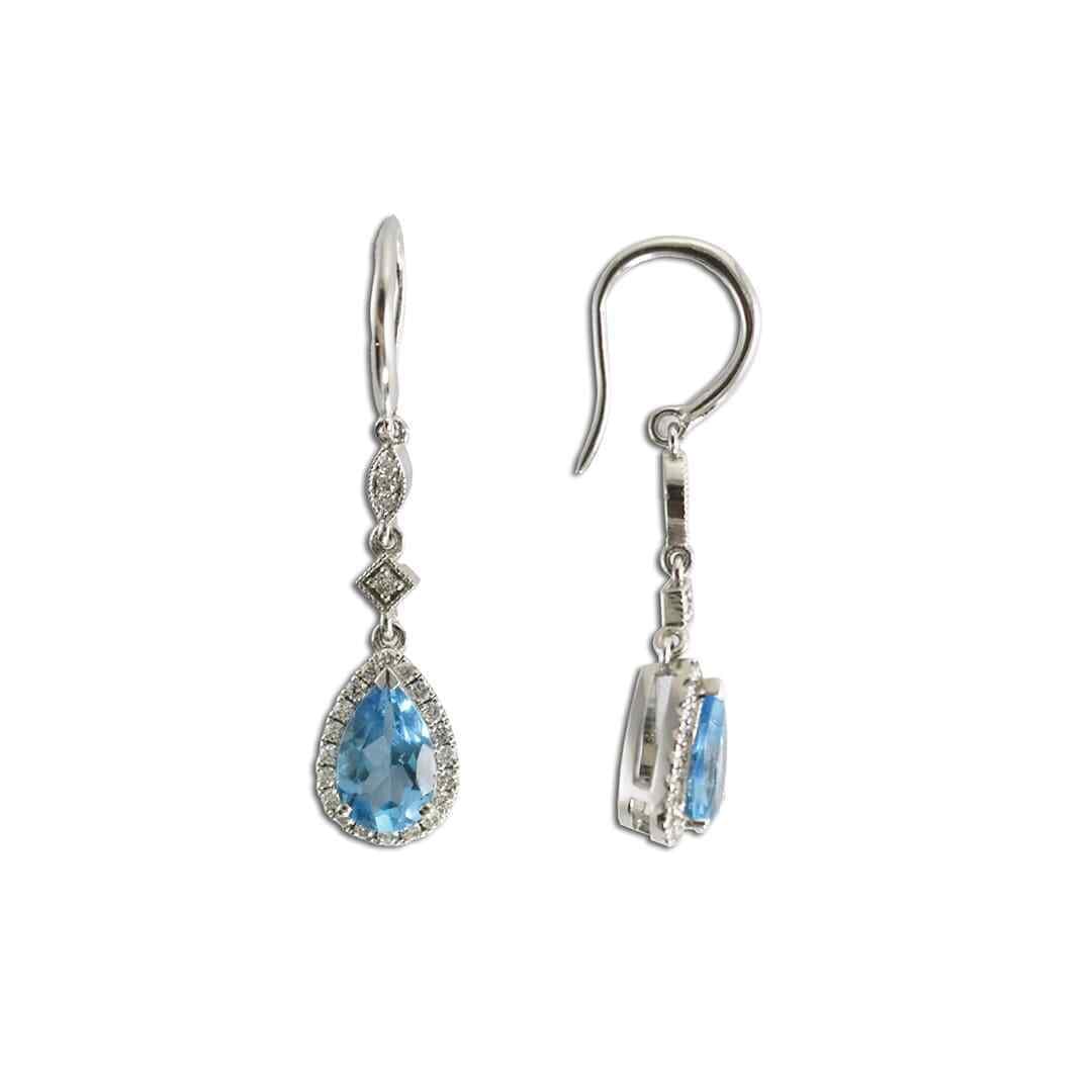 14K White Gold Pear Blue Topaz & Diamond Dangle Earrings 1.70 ctw: 14K White Gold Pear Blue Topaz & Diamond Dangle Earrings 1.70 ctw Elevate your elegance with these stunning 14K white gold dangle earrings adorned with natural blue topaz and sparkling diamonds. Featu