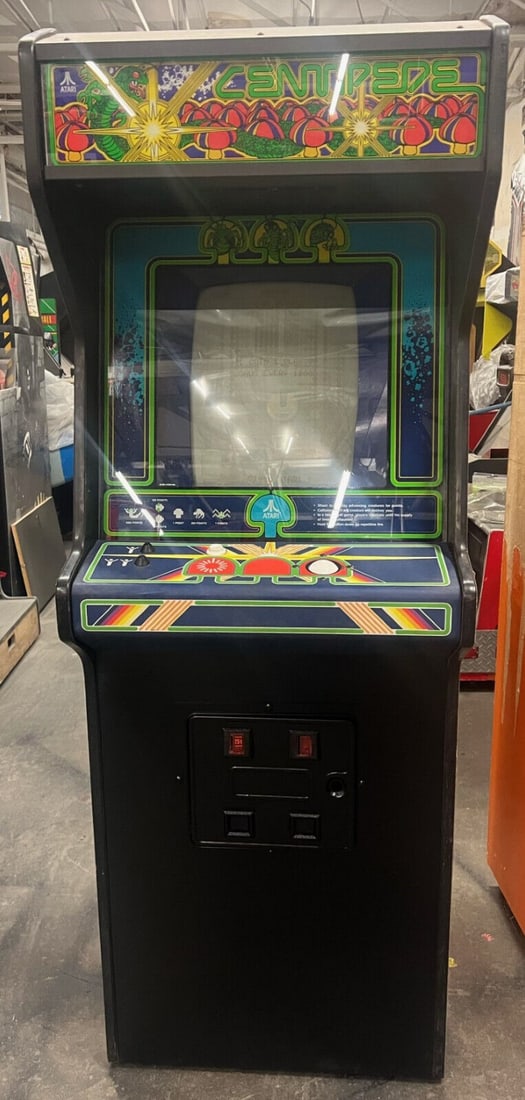 Centipede Arcade Machine 1980 (Excellent Condition): Centipede Arcade Machine 1980 (Excellent Condition) This classic Centipede Arcade Machine by Atari, produced in 1980, is a stunning piece of gaming history. It is in excellent condition both inside an