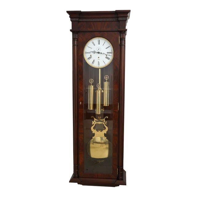 Model 743-1 Brass Triple Weight Driven Mahogany Wall Clock: Model 743-1 Brass Triple Weight Driven Mahogany Wall Clock This stunning Sligh Model 743-1 Mahogany Wall Hang Clock features a beautifully crafted mahogany front and is approximately 25 years old. Wit