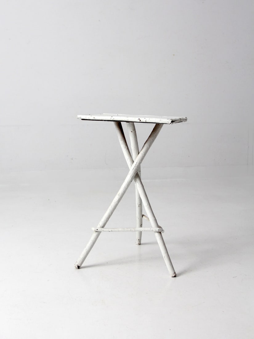 Antique White Adirondack Twig Table 23" Height Rustic Design: Antique White Adirondack Twig Table 23" Height Rustic Design This is an antique folk art twig table. The Adirondack style painted white table features rustic twig tripod legs with and wood top. Height