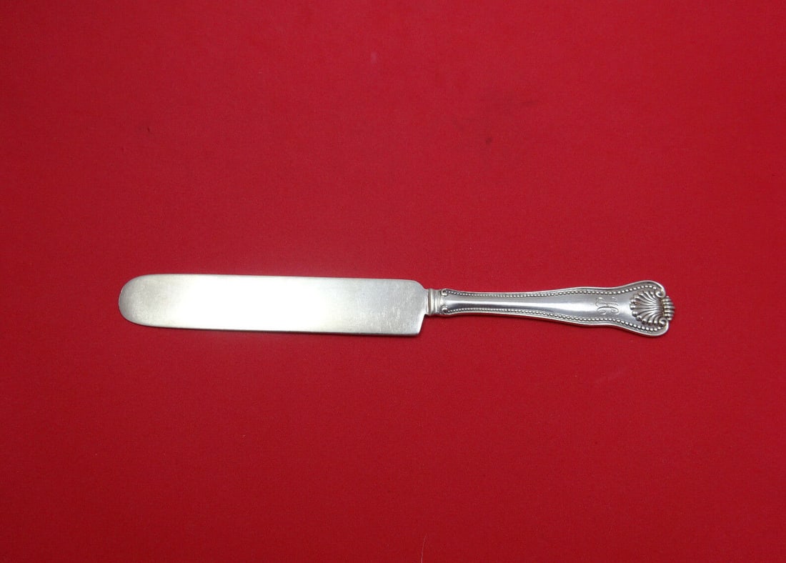 Newport Shell Sterling Silver Tea Knife 8 1/8": Newport Shell Sterling Silver Tea Knife 8 1/8" This exquisite tea knife features a flat handle design in the Newport Shell pattern by Frank Smith, crafted from high-quality sterling silver. Measuring