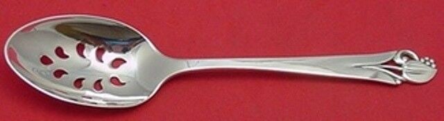 Woodlily Sterling Silver Pierced Serving Spoon 9-Hole Custom 8 1/8": Woodlily Sterling Silver Pierced Serving Spoon 9-Hole Custom 8 1/8" This exquisite Woodlily serving spoon, crafted by Frank Smith, showcases a beautiful pierced design with nine holes, making it a stu