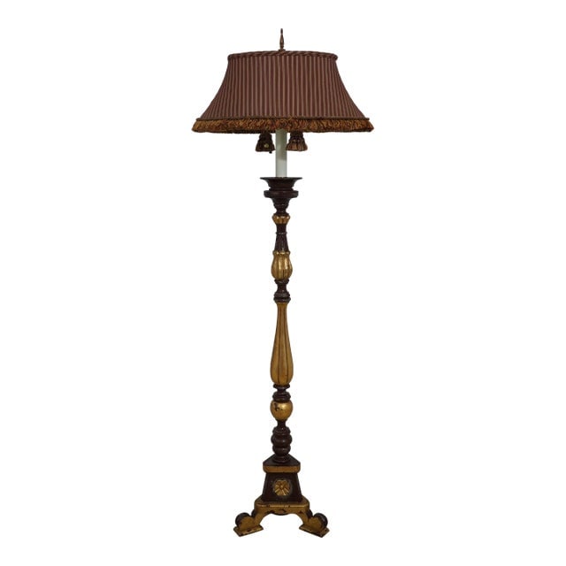 Baroque Style Carved Floor Lamp: Baroque Style Carved Floor Lamp This exquisite Baroque Style Floor Lamp by Frederick Cooper showcases quality craftsmanship with a beautifully carved base and a slender pole. The lamp features a decor