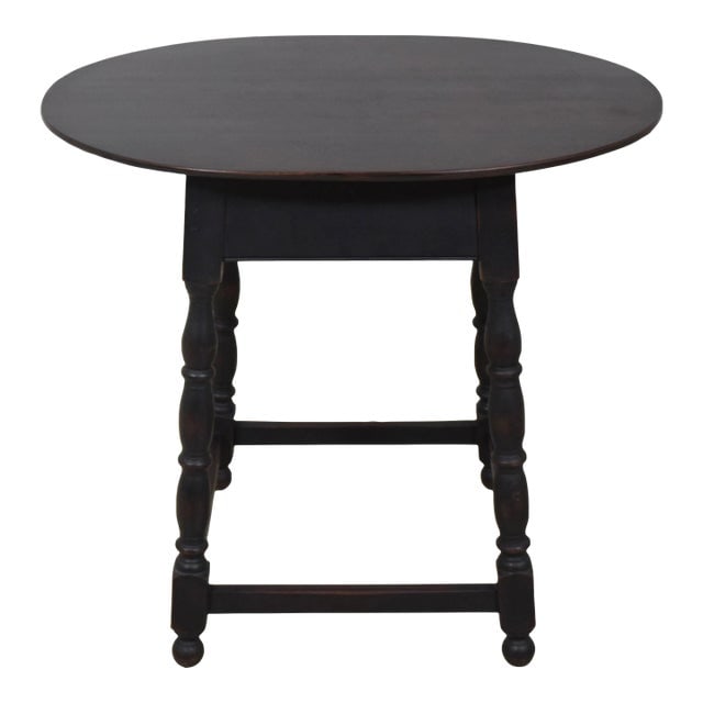 Bench Made Primitive Tavern Table with Black Crackle Finish: Bench Made Primitive Tavern Table with Black Crackle Finish This Lawrence Crouse bench-made primitive tavern table is a stunning example of high-quality craftsmanship. With its nice turned legs and a