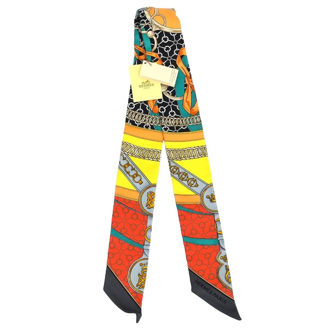 Hermes La Promenade Du Matin Twilly Scarf: Hermes La Promenade Du Matin Twilly Scarf Elevate your accessory game with this exquisite HERMES La Promenade Du Matin Twilly Scarf. Crafted from 100% silk, this square scarf showcases a vibrant geome