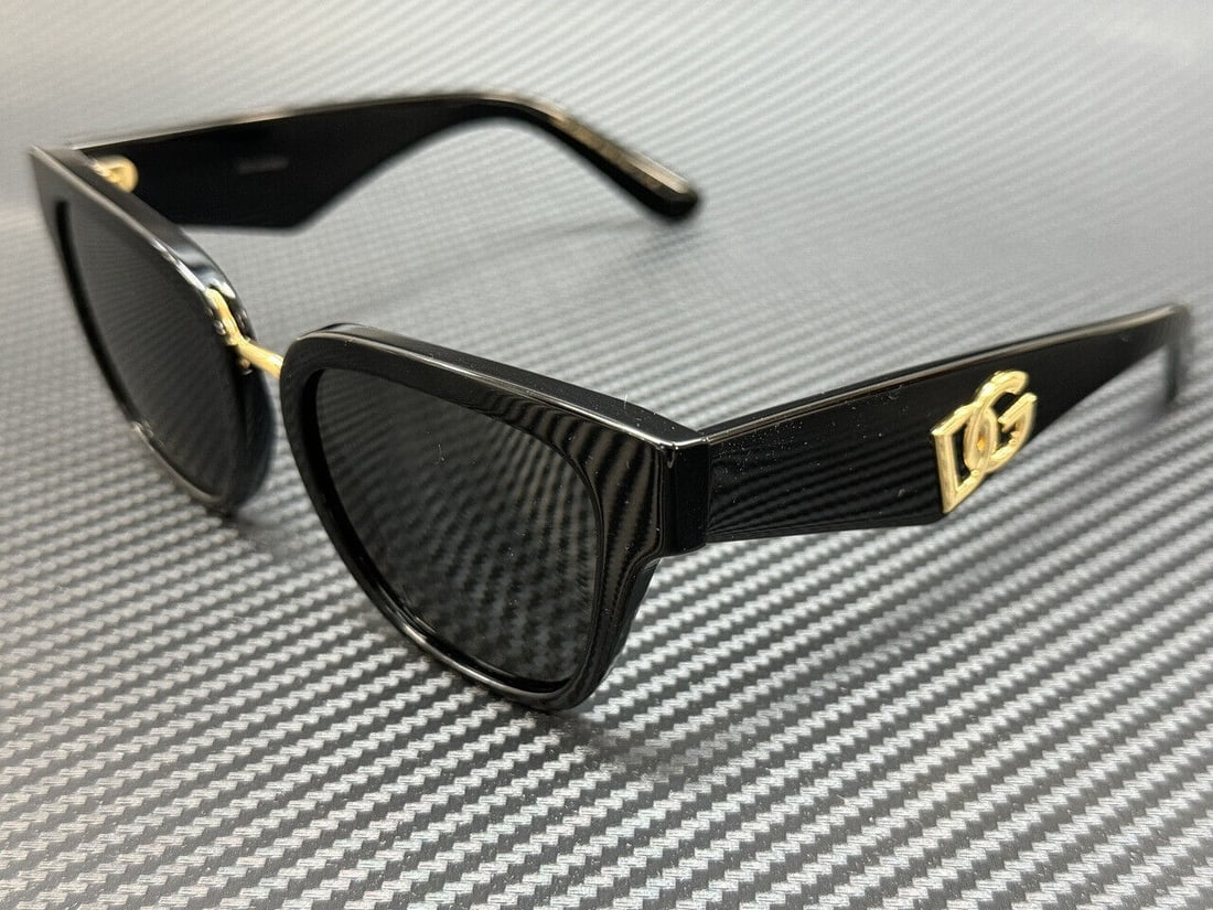 Dolce&Gabbana DG4437 Black 51mm Women's Sunglasses with Gold Logo: Dolce&Gabbana DG4437 Black 51mm Women's Sunglasses with Gold Logo Elevate your style with these Dolce & Gabbana DG4437 sunglasses. Featuring a sleek black frame and a striking gold logo on the side, t