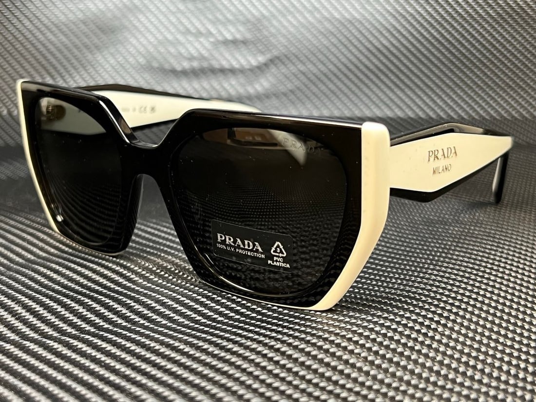 PRADA PR 15WS 09Q5S0 Black Rectangle Gray Women's Sunglasses: PRADA PR 15WS 09Q5S0 Black Rectangle Gray Women's Sunglasses Introducing the PRADA PR 15WS 09Q5S0 Women's Sunglasses, a stylish accessory for any modern wardrobe. These sunglasses feature a sleek blac