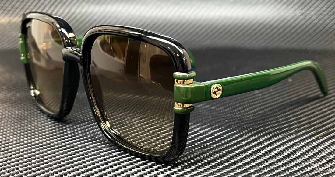 GUCCI GG1066S 003 Black Large Women's Sunglasses: GUCCI GG1066S 003 Black Large Women's Sunglasses Elevate your accessory game with these stunning GUCCI GG1066S sunglasses. Designed for women, these sunglasses feature a sleek black frame complemented