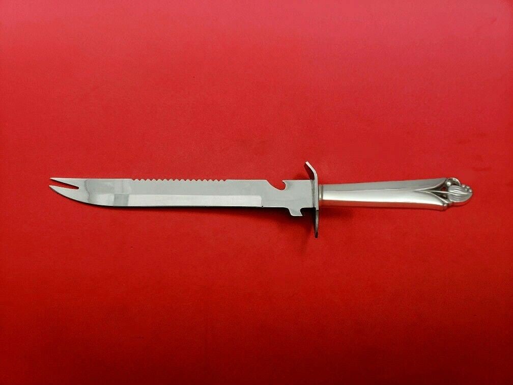 Woodlily Sterling Silver Ham Slice Knife 11 1/2" Custom Made: Woodlily Sterling Silver Ham Slice Knife 11 1/2" Custom Made Introducing the Woodlily ham slice by Frank Smith, a beautifully crafted knife made from sterling silver with a hollow handle and a stainle