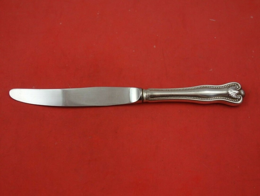 Newport Shell Sterling Silver Regular Knife Modern 8 3/4": Newport Shell Sterling Silver Regular Knife Modern 8 3/4" This exquisite regular knife features the Newport Shell pattern by Frank Smith, crafted from high-quality sterling silver with a stainless ste