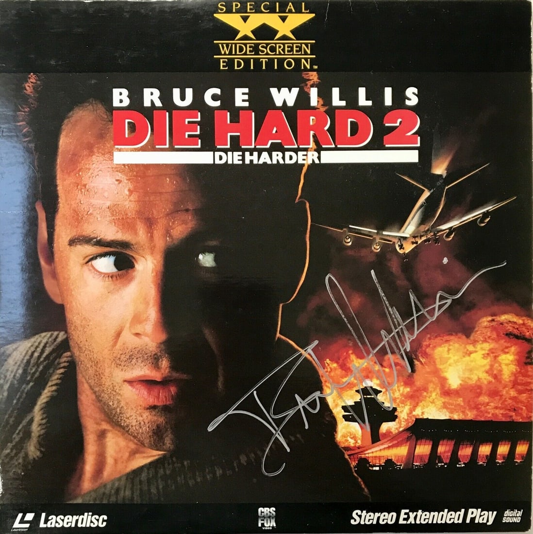 Bruce Willis Autographed Die Harder 2 Laser Disc Cover: Bruce Willis Autographed Die Harder 2 Laser Disc Cover This is an original LaserDisc cover of the movie 'Die Harder 2,' autographed by Bruce Willis. The signature is in silver sharpie and is prominent