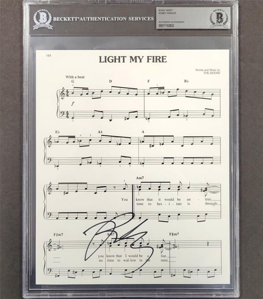 Robby Krieger signed Light My Fire 8x10 music sheet Doors auto: Robby Krieger signed Light My Fire 8x10 music sheet Doors auto This is an original signed 8x10 music sheet for 'Light My Fire' by The Doors, featuring the iconic song's musical notes. The autograph is