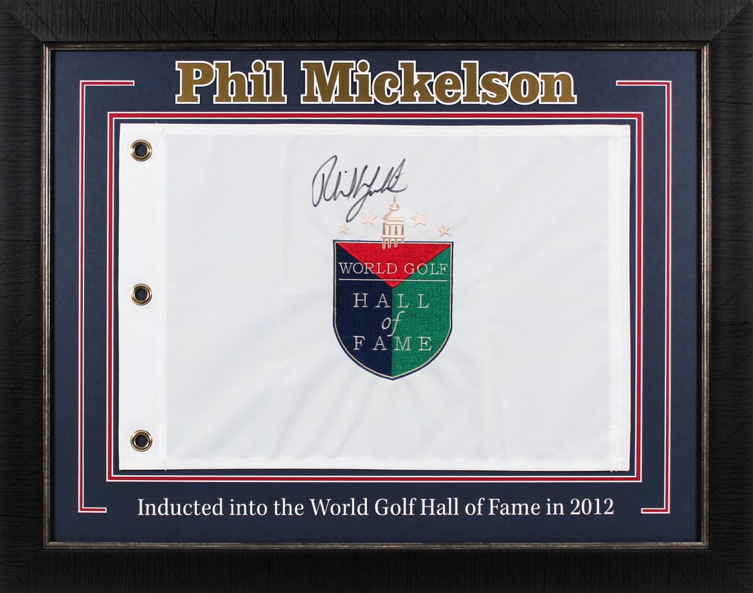 Phil Mickelson Signed & Framed Golf-PGA Flag PSA: Phil Mickelson Signed & Framed Golf-PGA Flag PSA Celebrate golf history with this original signed and framed World Golf Hall of Fame pin flag, featuring the name of legendary golfer Phil Mickelson. Th