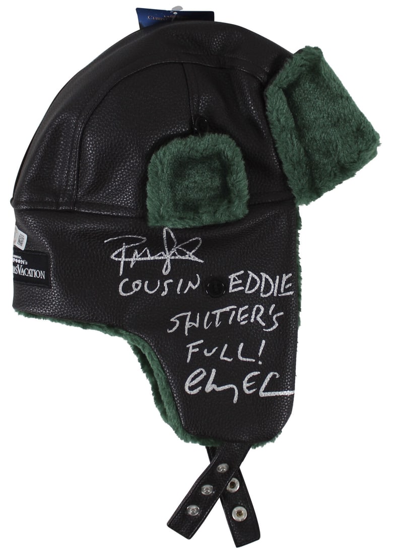 Chevy Chase & Randy Quaid Signed Hat National Lampoon's Christmas Vacation: Chevy Chase & Randy Quaid Signed Hat National Lampoon's Christmas Vacation This is a pre-owned black leather aviator hat with green fur lining, featuring the signatures of Chevy Chase and Randy Quaid.