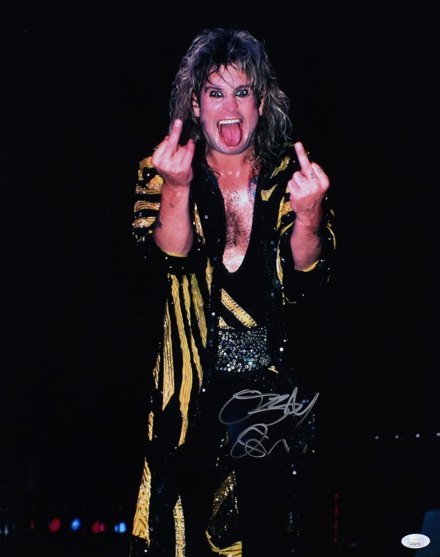 Ozzy Osbourne Autographed 16x20 Photo - JSA W *Silver: Ozzy Osbourne Autographed 16x20 Photo - JSA W *Silver This is an original autographed 16x20 photograph of Ozzy Osbourne, showcasing the iconic performer in a striking black and yellow striped outfit w
